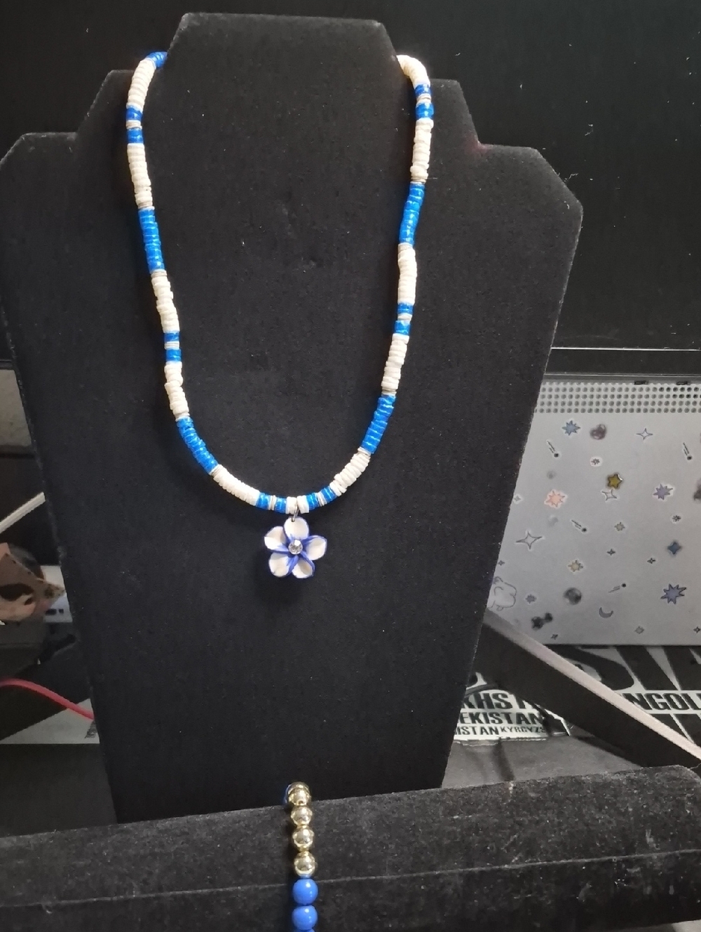 Blue and White Beaded Necklace with Flower Pendant